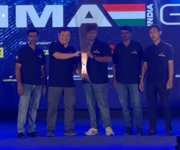 The Autoplanet team on stage at the EMMA India awards, holding the trophy for the Expert Unlimited result at EMMA BLR Underground 2025
